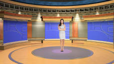 Virtual Set Studio 114 for 4K is a circular room with presentation monitors all around it.