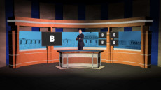 Virtual Set Studio 103 for 4K is a newsdesk with a wireframe of the capital in the background.