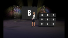 Virtual Set Studio 111 for 4K is a stage with various screens and lots of colorful lighting.